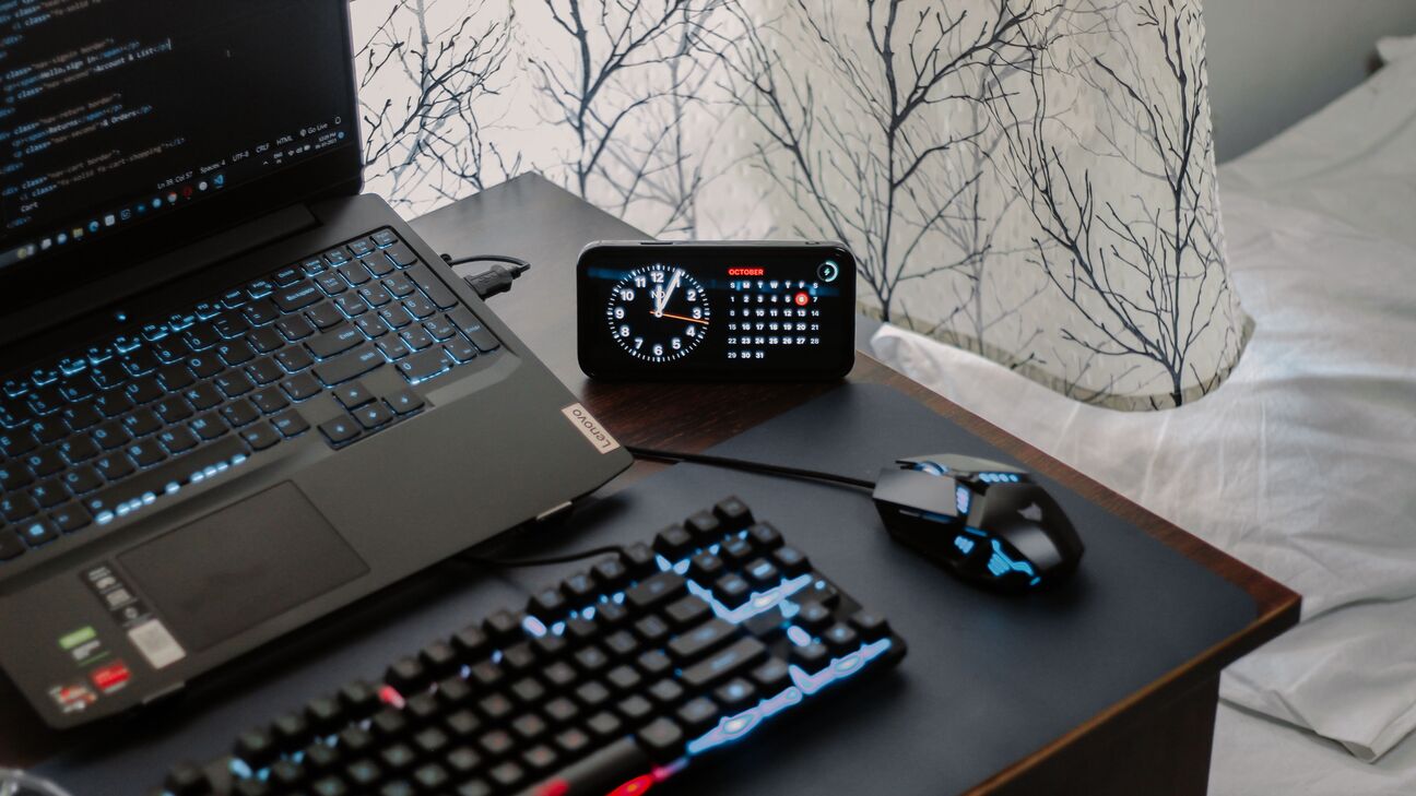 Modern RGB desk setup with monitor lighting